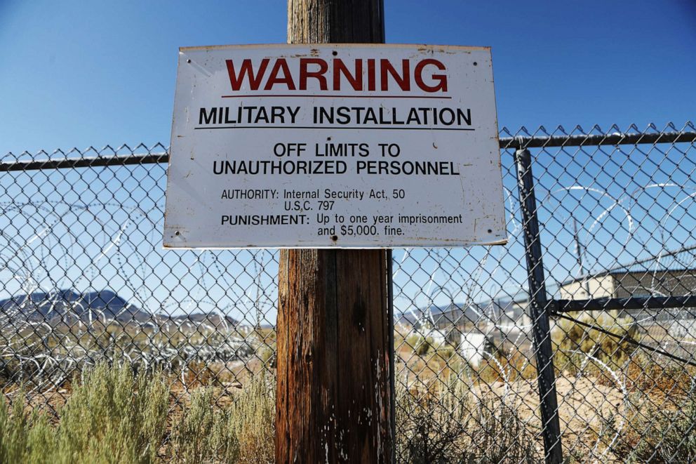 PHOTO: A warning sign is posted at an entrance gate to the Nevada Test and Training Range, the government's official name for what is known as Area 51, Sept. 21, 2019, near Rachel, Nevada. 