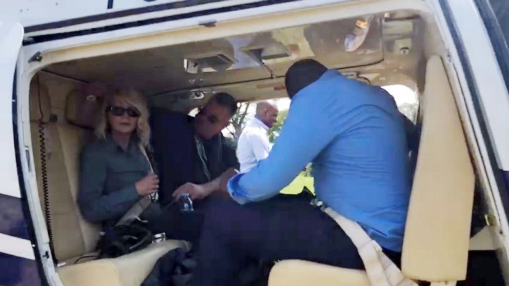 PHOTO: U.S. tourist Kimberly Sue Endicott is seen after her rescue as she departs for Kampala, Uganda, in this still image taken from a video obtained by social media on April 9, 2019.