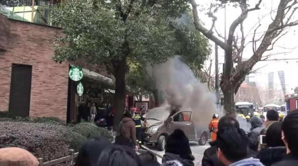 A van injured 17 people when it crashed into a fence outside a Starbucks in Shanghai, China, on Feb. 2, 2018.