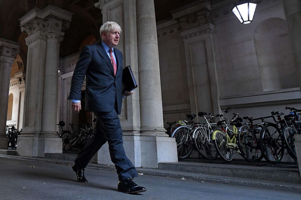 PHOTO: British Prime Minister Boris Johnson walks to Downing Street in central London on Sept. 22, 2020, after attending the weekly meeting of the cabinet at the U.K. Foreign, Commonwealth and Development Office.