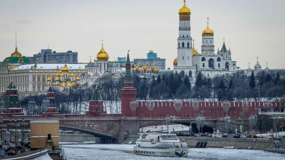 PHOTO: A tourist boat breaks through the frozen Moskva river outside the Kremlin in Moscow on March 13, 2018.