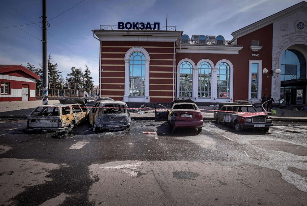 PHOTO: Calcinated cars are pictured outside a train station in Kramatorsk, eastern Ukraine, that was being used for civilian evacuations, after it was hit by a rocket attack, April 8, 2022. 
