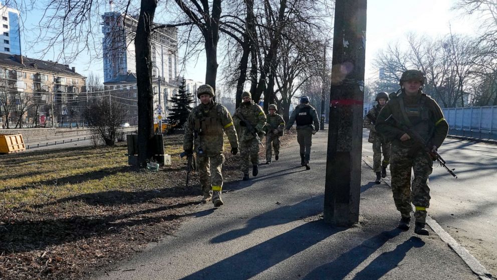 PHOTO: Ukrainian soldiers patrol a street in Kyiv, Ukraine, Feb. 26, 2022.