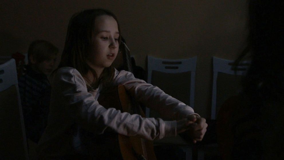 PHOTO: Ruth Gorshkova, 10, says she's determined to continue attending her guitar lessons despite blackouts in Kyiv, Ukraine. 
