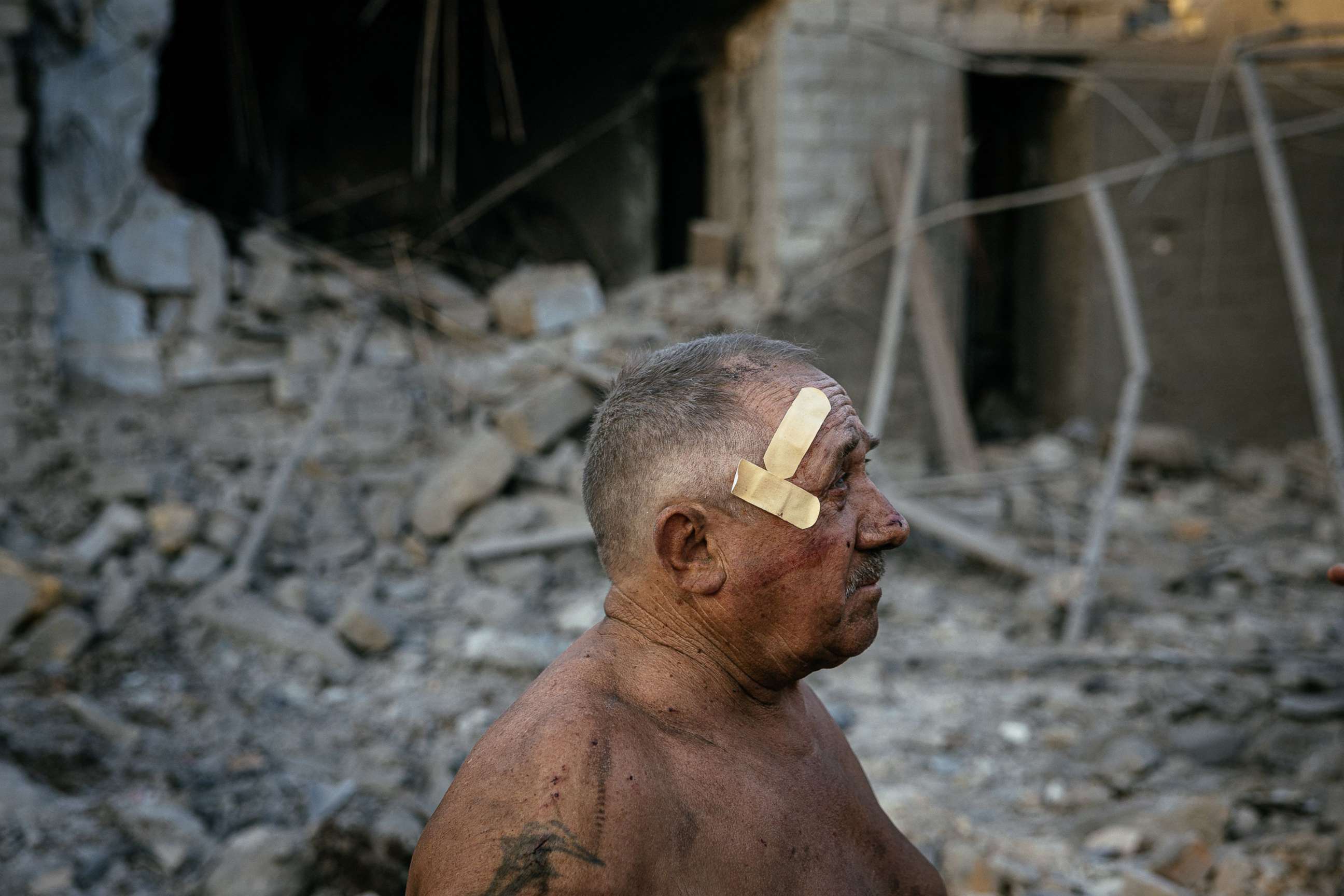 PHOTO: Oleksandr Shulga looks at his destroyed house following a missile strike in Mykolaiv in the southern region of Ukraine, Aug. 29, 2022.