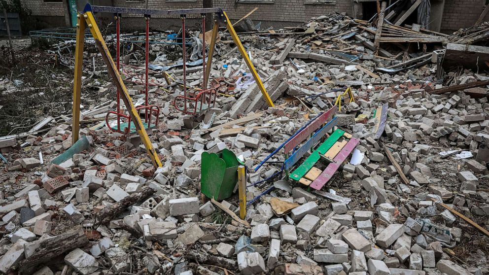 PHOTO: This photograph taken on Sep. 30, 2022 shows a playground in a yard of a destroyed apartment building in the town of Sviatohirsk, Ukraine.