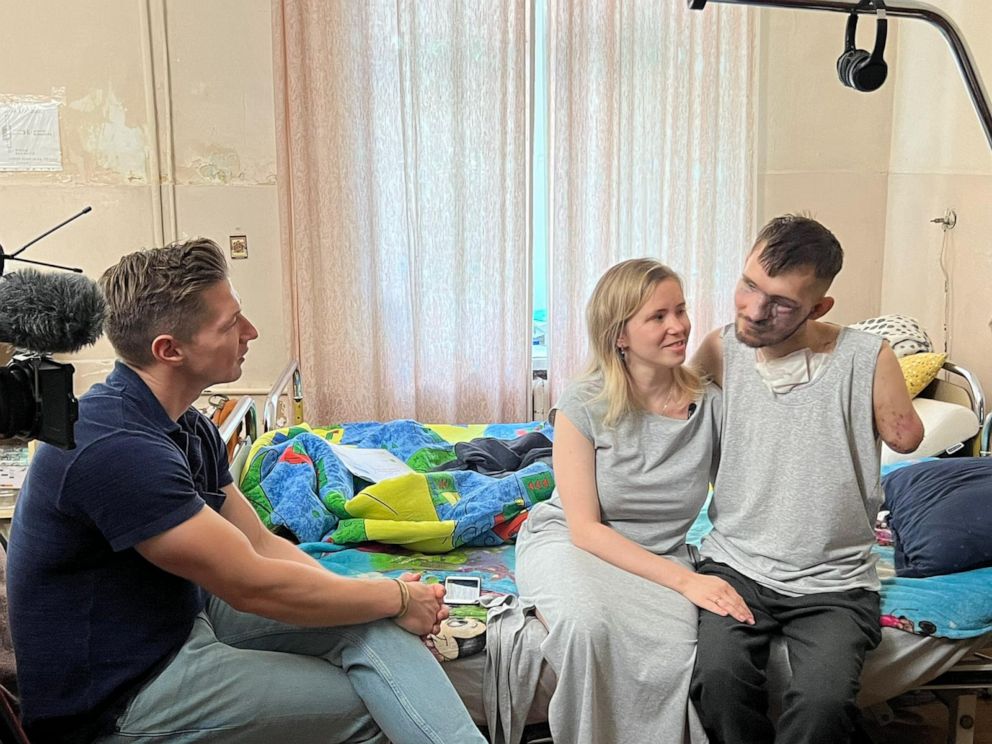 PHOTO: Alina and Andriy Smolensky sat down with ABC News' Foreign Correspondent James Longman in Kyiv on 21 July, 2023. Andriy lost both his arms, and his eyesight, when a shell exploded in front of him while in the trenches in the spring.