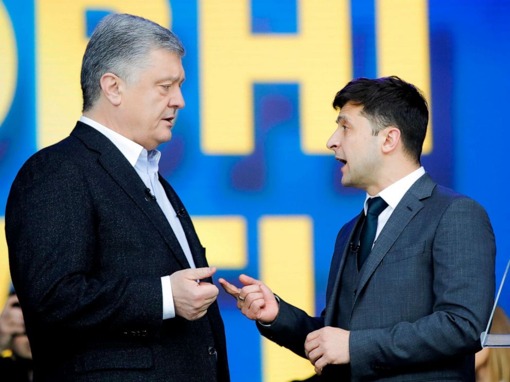 PHOTO: Ukrainian President Petro Poroshenko, left, and Ukrainian presidential candidate and popular comedian Volodymyr Zelenskiy, right, argue their debates at the Olympic stadium in Kiev, Ukraine, April 19, 2019.