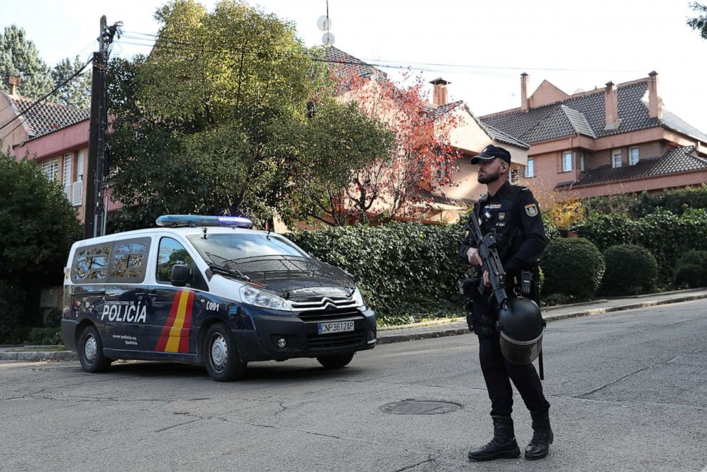 PHOTO: A police officer stands outside the Ukrainian embassy in Madrid after a bloody package arrived at the embassy, in the wake of several letter bombs arriving at targets connected to Spanish support of Ukraine, in Madrid, Spain, Dec. 2, 2022.