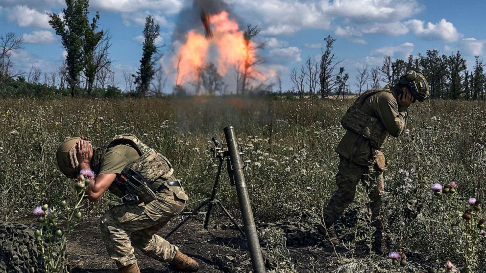 PHOTO: Ukrainian soldiers fire a mortar towards Russian positions at the front line, near Bakhmut, Donetsk region, Ukraine, on Aug. 12 2023.
