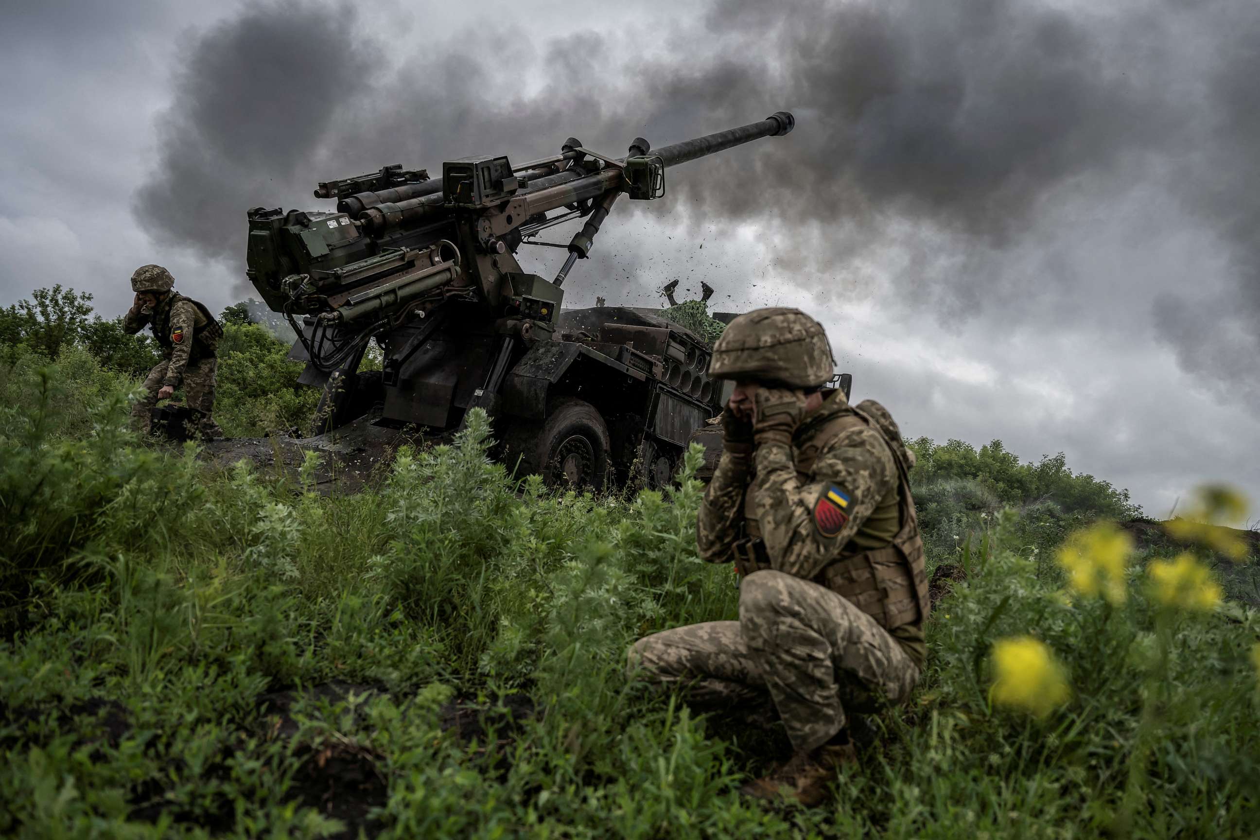 PHOTO: Ukrainian service members of the 55th Separate Artillery Brigade fire a Caesar self-propelled howitzer towards Russian troops, amid Russia's attack on Ukraine, near the town of Avdiivka in Donetsk region, Ukraine, May 31, 2023.