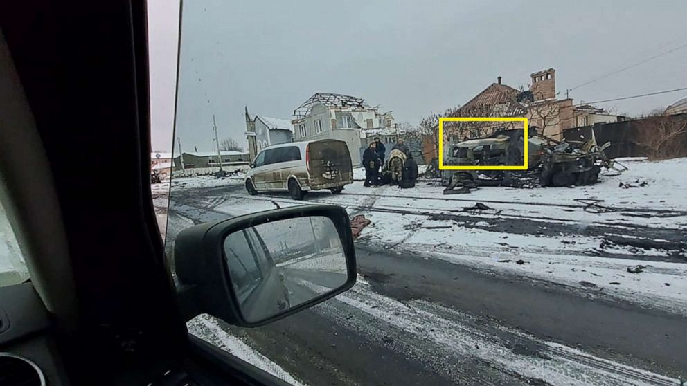 PHOTO: In this photo a group of people treat an injured woman before a missile, highlighted here in the box, hit and killed Pete Reed, Feb. 2, 2023, in Bakhmut, Ukraine.