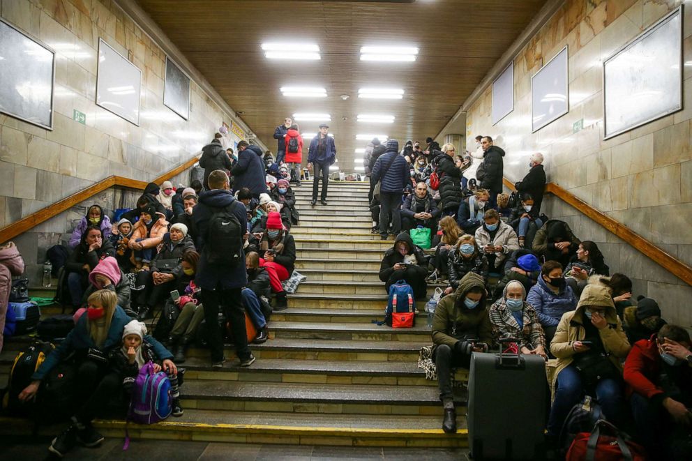 PHOTO: People take shelter in a subway station, after Russian President Vladimir Putin authorized a military operation in eastern Ukraine, in Kyiv, Ukraine, Feb. 24, 2022.