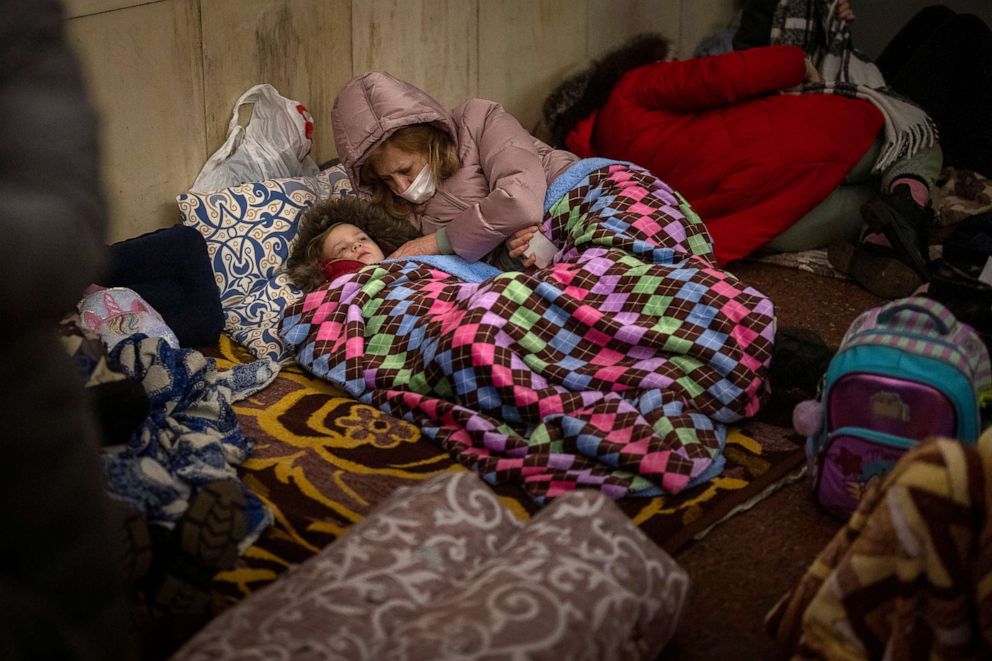 PHOTO: People rest in the Kyiv subway, using it as a bomb shelter in Kyiv, Ukraine, on Feb. 24, 2022.