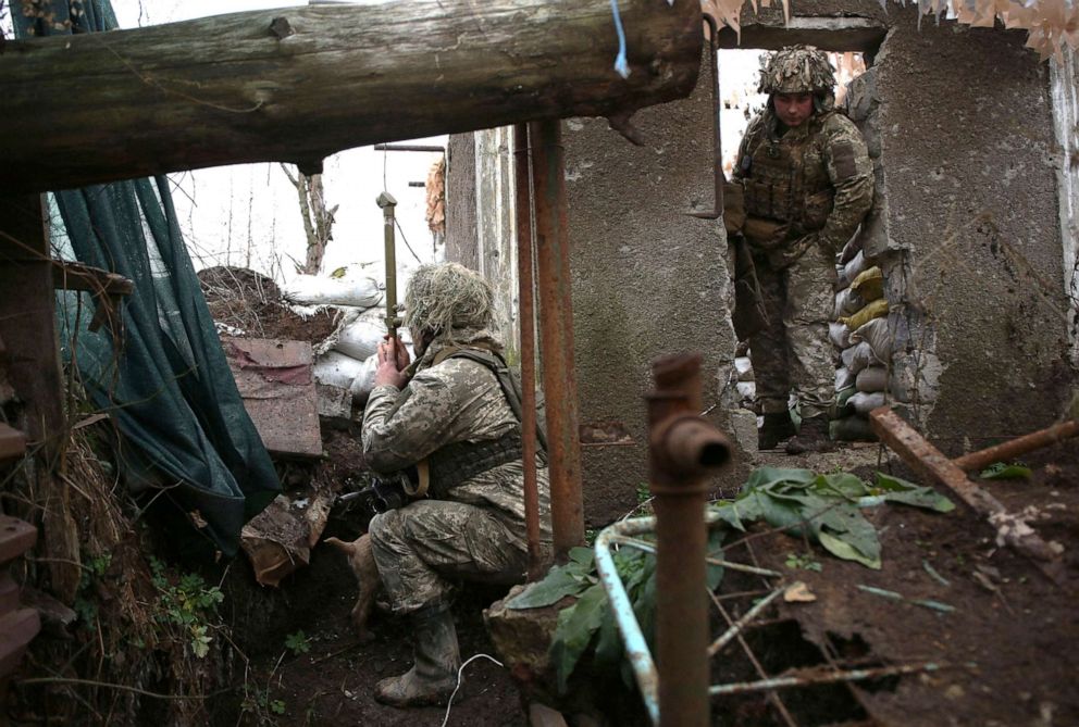 PHOTO: Ukrainian soldiers keep watch on the frontline with Russia-backed separatists, not far from town of Avdiivka, Donetsk region, Ukraine, on Dec. 10, 2021.