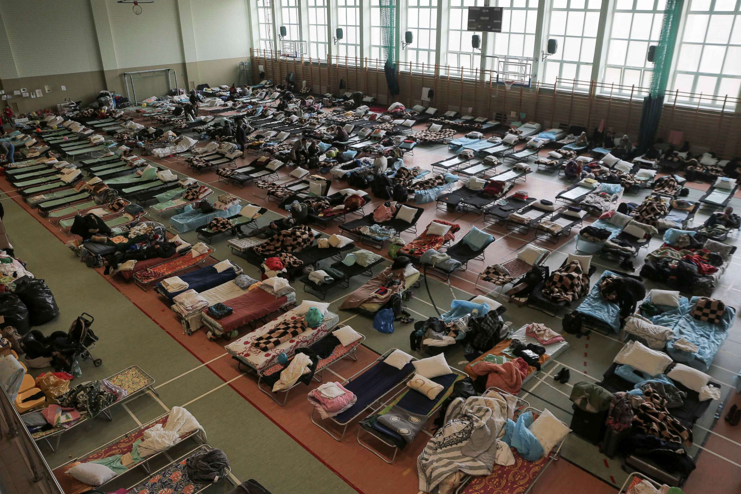 PHOTO: Hundreds of beds are placed inside a sports hall to accommodate Ukrainian refugees fleeing Russian invasion at the border crossing town of Medyka, Poland, March 1, 2022.