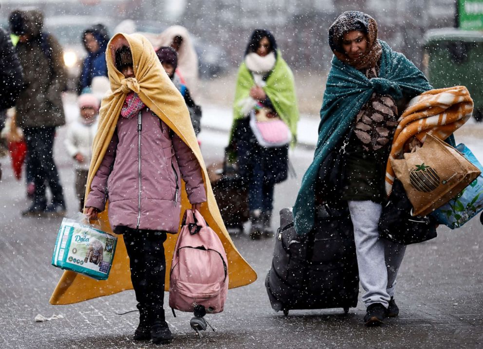 PHOTO: People fleeing Russian invasion of Ukraine, arrive at a temporary camp in Przemysl, Poland, Feb. 28, 2022.