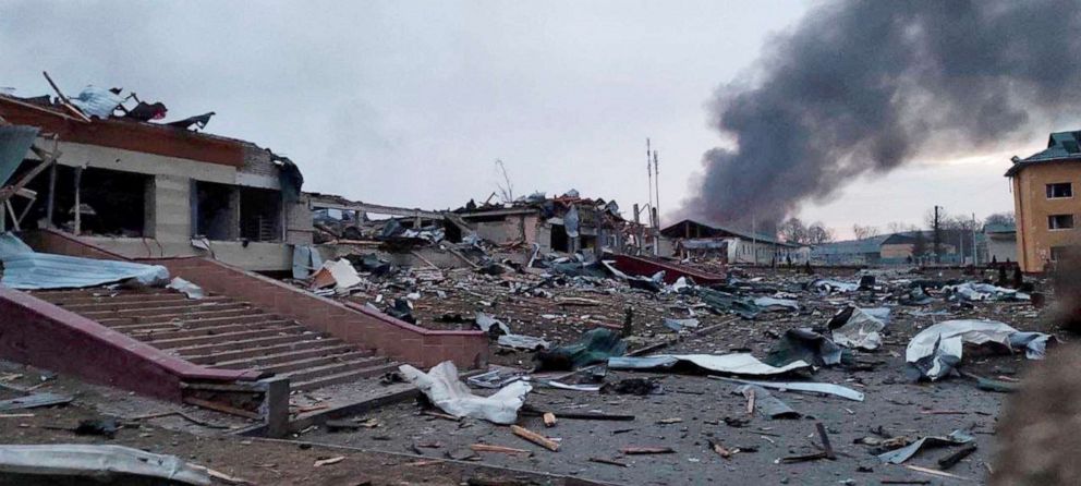 PHOTO: Smoke rises amid damaged buildings following an attack on the Yavoriv military base, as Russia's invasion of Ukraine continues, in Yavoriv, Lviv Oblast, Ukraine, March 13, 2022 in this picture obtained from social media.