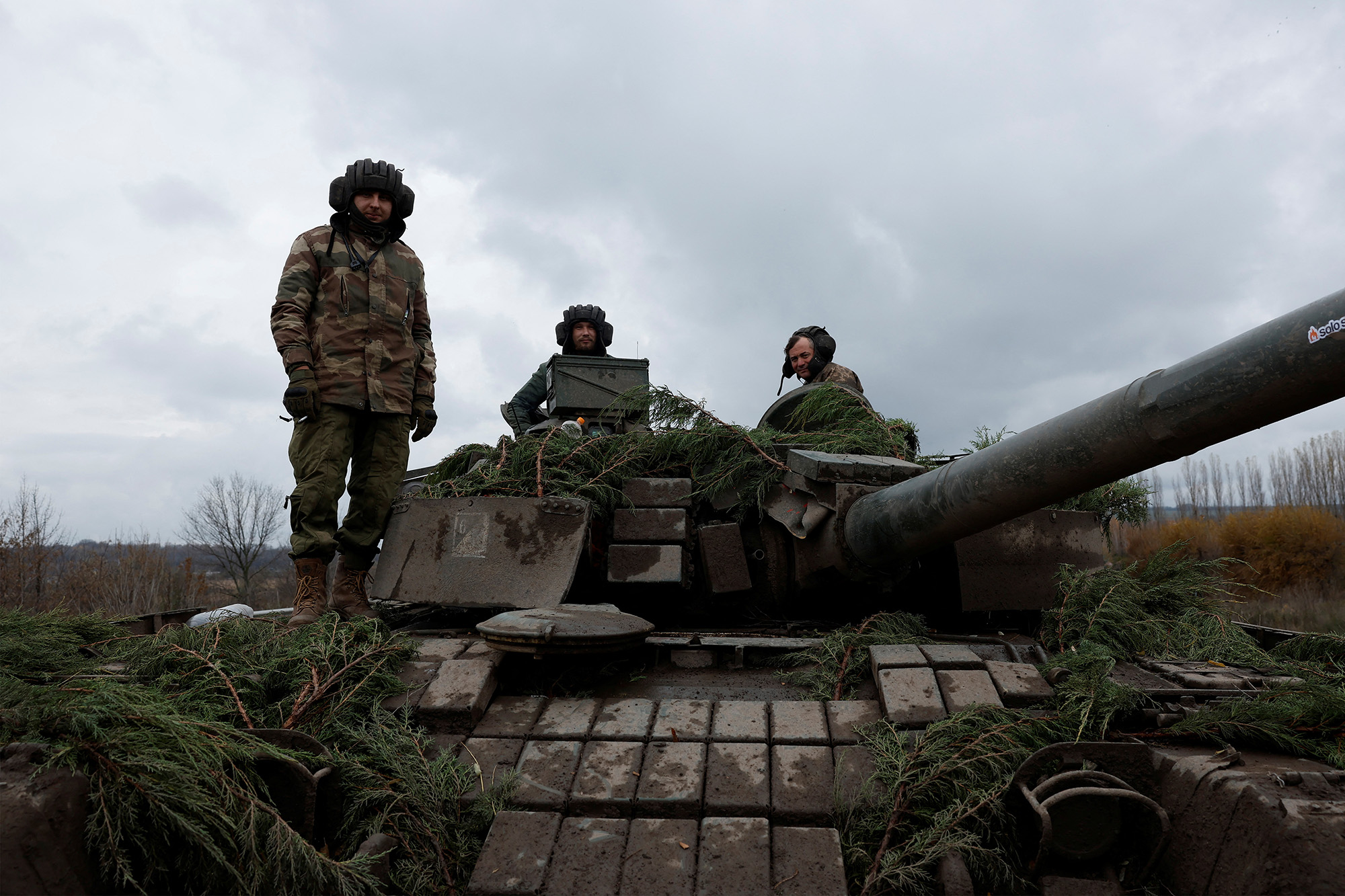 PHOTO: Ukrainian soldiers prepare to fire a round on the frontline from a T80 tank that was captured from Russians during a battle in Trostyanets in March, in the eastern Donbas region of Bakhmut, Ukraine, Nov. 4, 2022. 