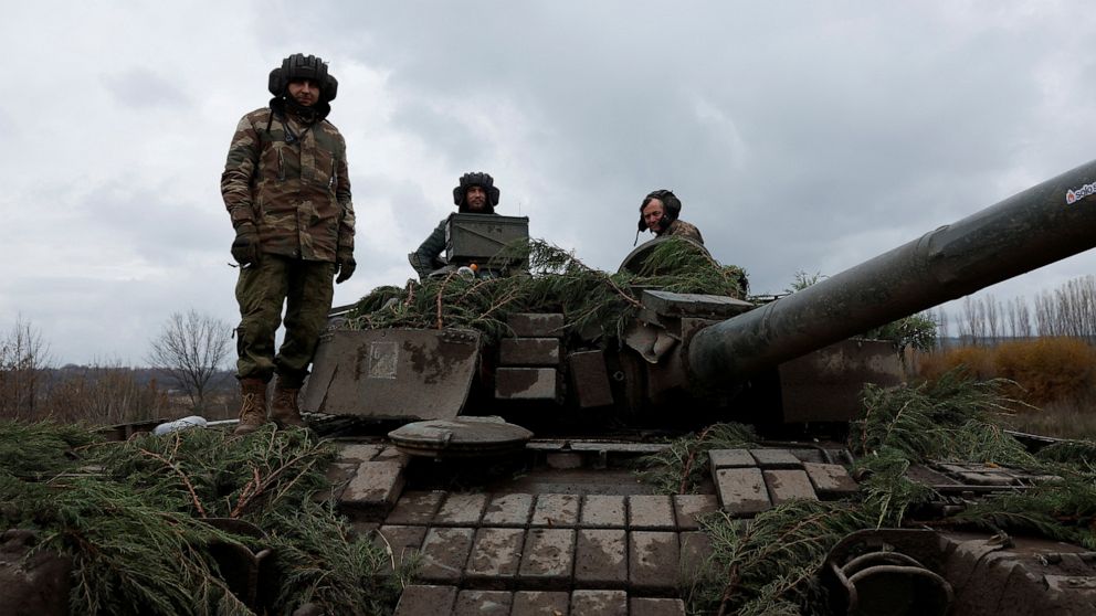 PHOTO: Ukrainian soldiers prepare to fire a round on the frontline from a T80 tank that was captured from Russians during a battle in Trostyanets in March, in the eastern Donbas region of Bakhmut, Ukraine, Nov. 4, 2022. 