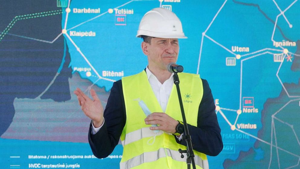 PHOTO: Lithuanian Minister of Energy Dainius Kreivys speaks in the port of Klaipeda, Lithuania, May 13, 2021.