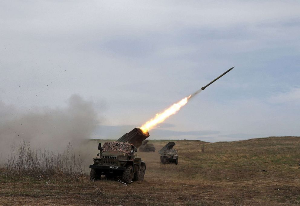 PHOTO: A Ukrainian multiple rocket launcher BM-21 "Grad" shells Russian troops' position, near Lugansk, in the Donbas region of Ukraine, April 10, 2022. 