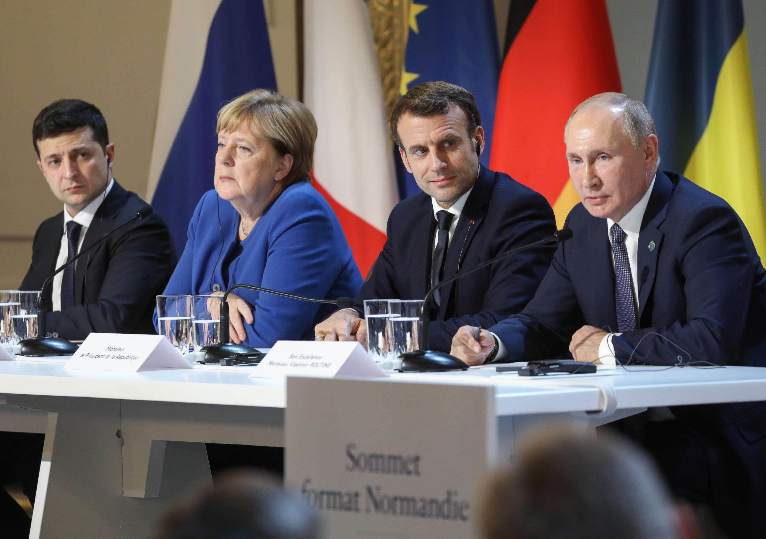 PHOTO: (FromL) Ukrainian President Volodymyr Zelenskyy, German Chancellor Angela Merkel, French President Emmanuel Macron and Russian President Vladimir Putin give a press conference after a summit at the Elysee Palace, in Paris, on Dec. 9, 2019.