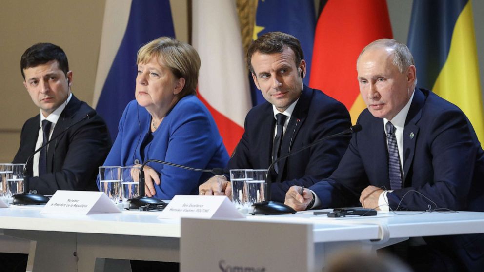PHOTO: (FromL) Ukrainian President Volodymyr Zelenskyy, German Chancellor Angela Merkel, French President Emmanuel Macron and Russian President Vladimir Putin give a press conference after a summit at the Elysee Palace, in Paris, on Dec. 9, 2019.