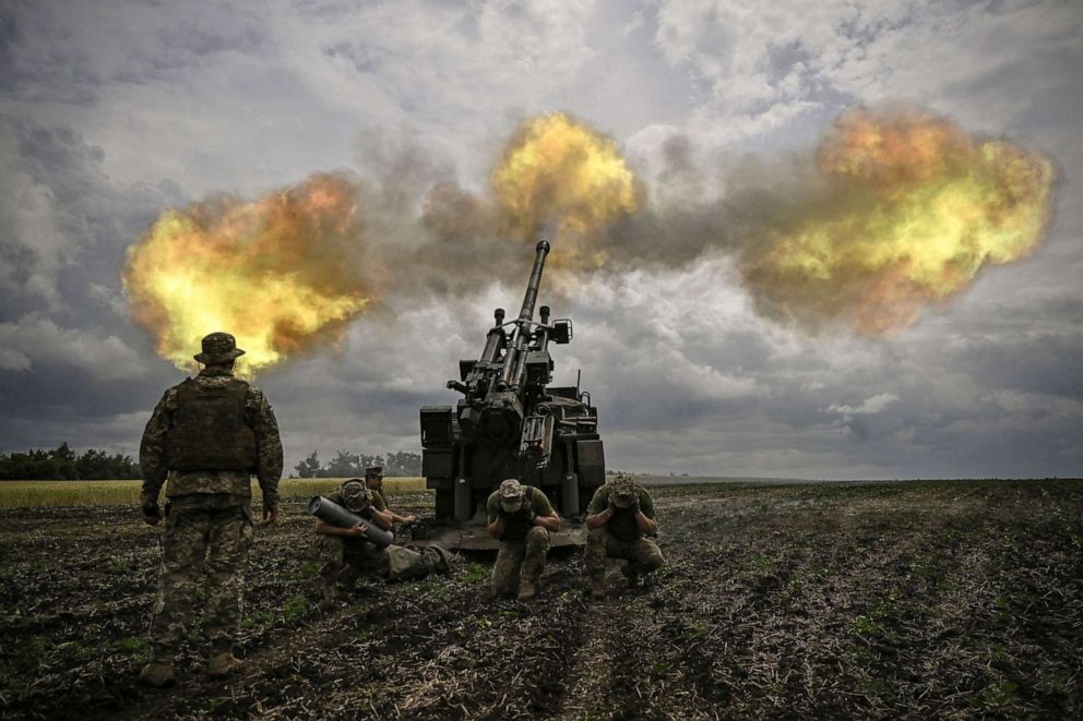 PHOTO: Ukrainian servicemen fire with a French self-propelled 155 mm/52-calibre gun Caesar towards Russian positions at a front line in the eastern Ukrainian region of Donbas, Ukraine, June 15, 2022. 