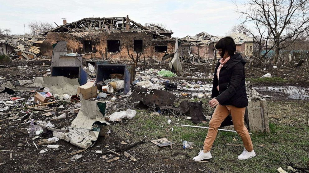 PHOTO: A local resident walks next to a damaged house after a Russian missile strike in the town of Kostyantynivka, in the Donetsk region, April 2, 2023, amid the Russian invasion of Ukraine.