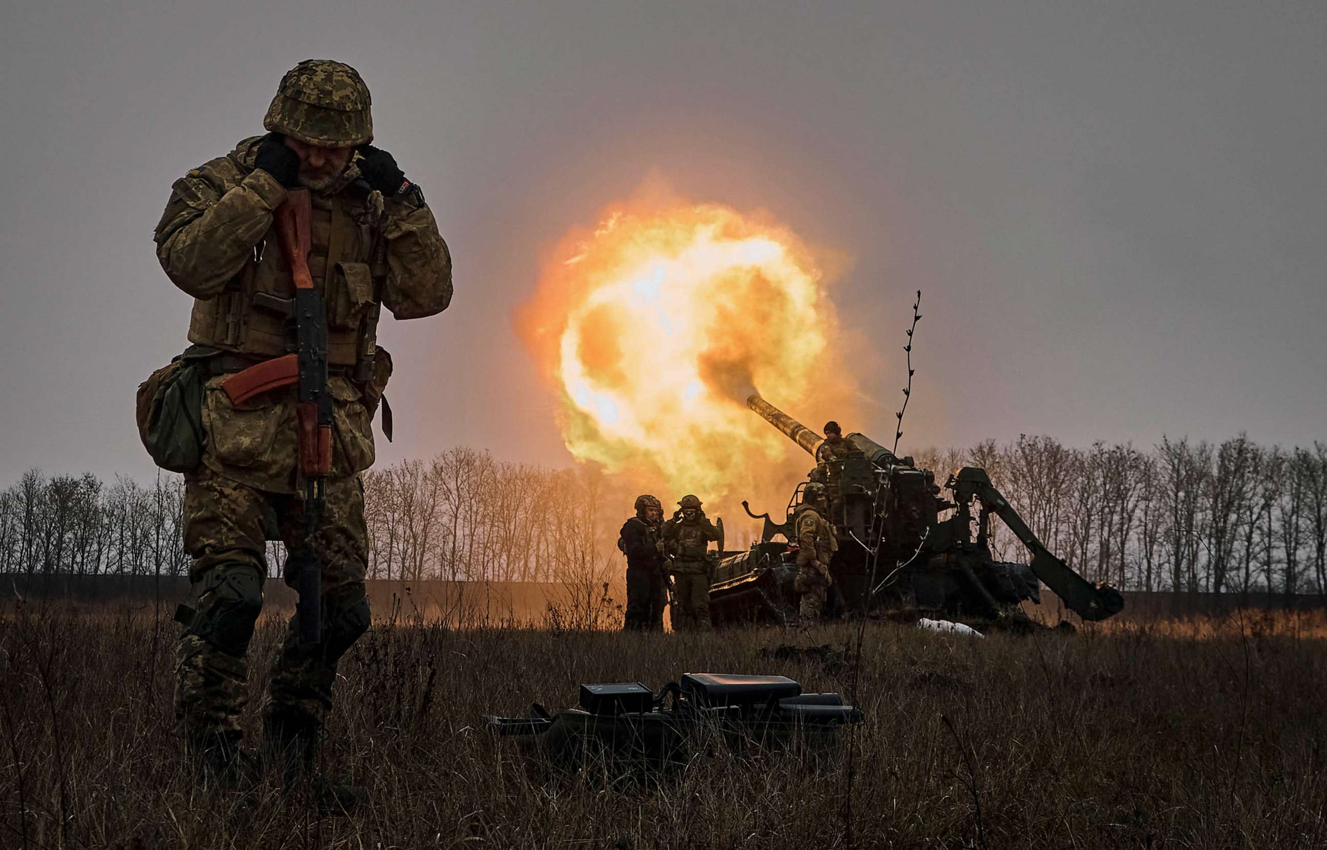 PHOTO: FILE - Ukrainian soldiers fire a Pion artillery system at Russian positions near Bakhmut, Donetsk region, Ukraine, Dec. 16, 2022.