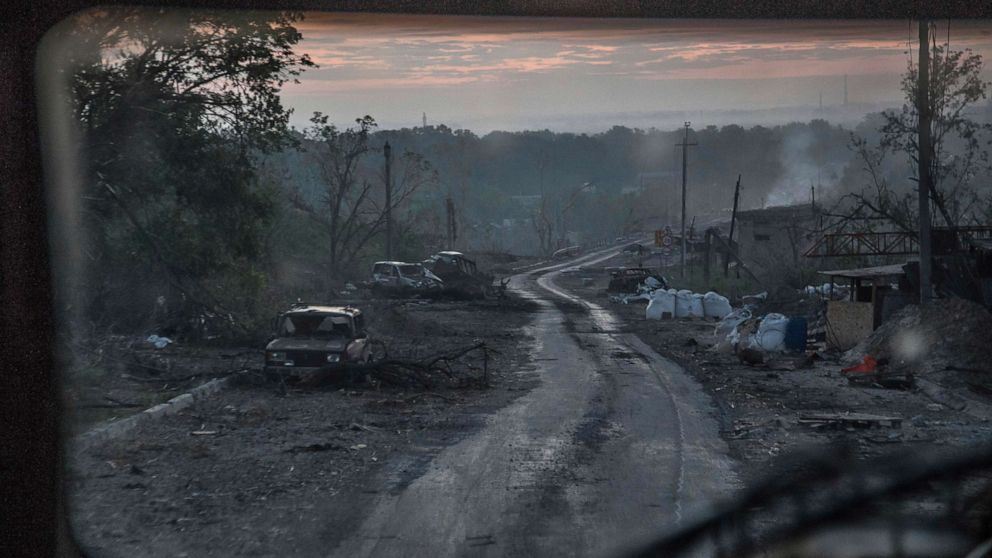 PHOTO: The gutted remains of cars lie along a road during heavy fighting at the front line in Severodonetsk, Luhansk region, Ukraine, June 8, 2022.