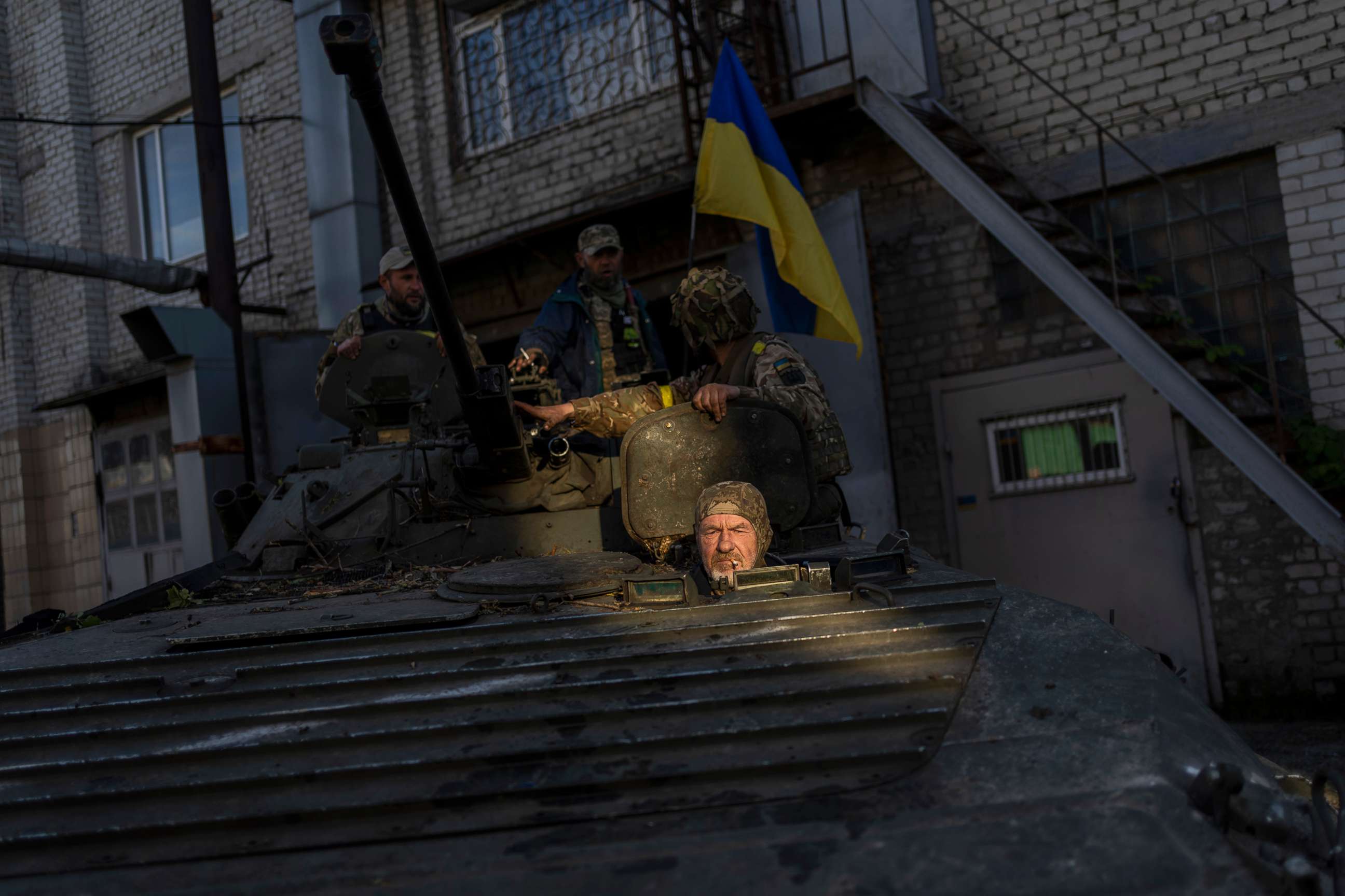 PHOTO: Ukrainian servicemen park a Russian BMP-2, an infantry combat vehicle, in the Kharkiv area of eastern Ukraine, May 29, 2022.