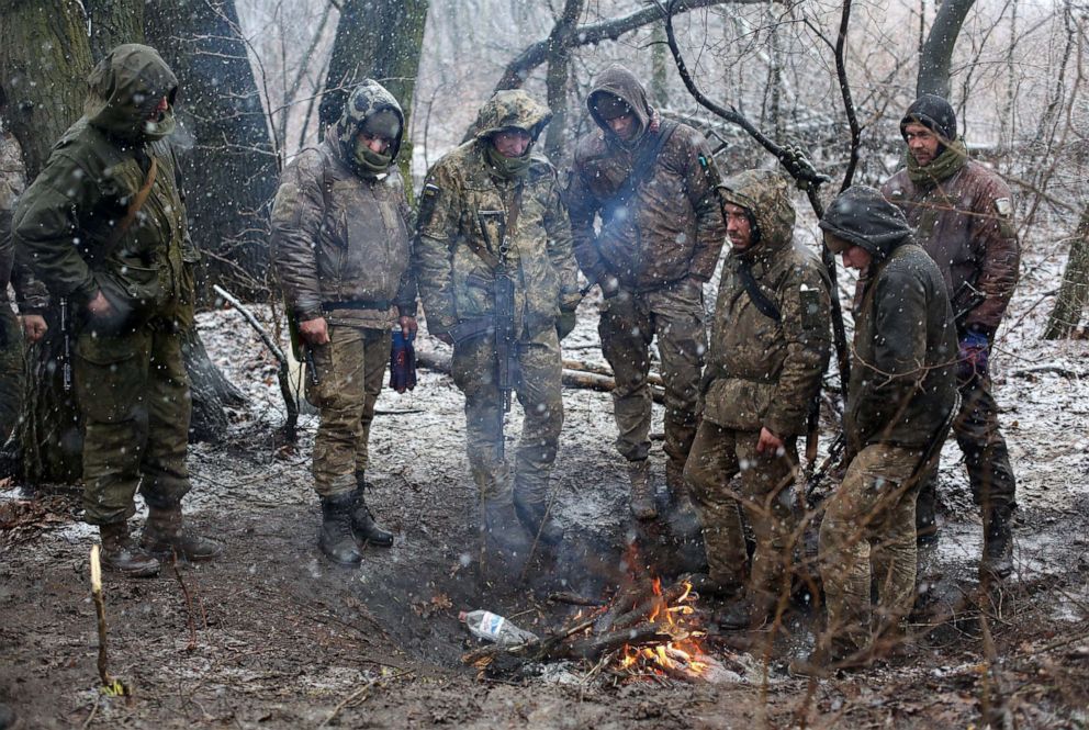 PHOTO: Ukrainian military set a fire to get warm in the Luhansk region on March 3, 2022.