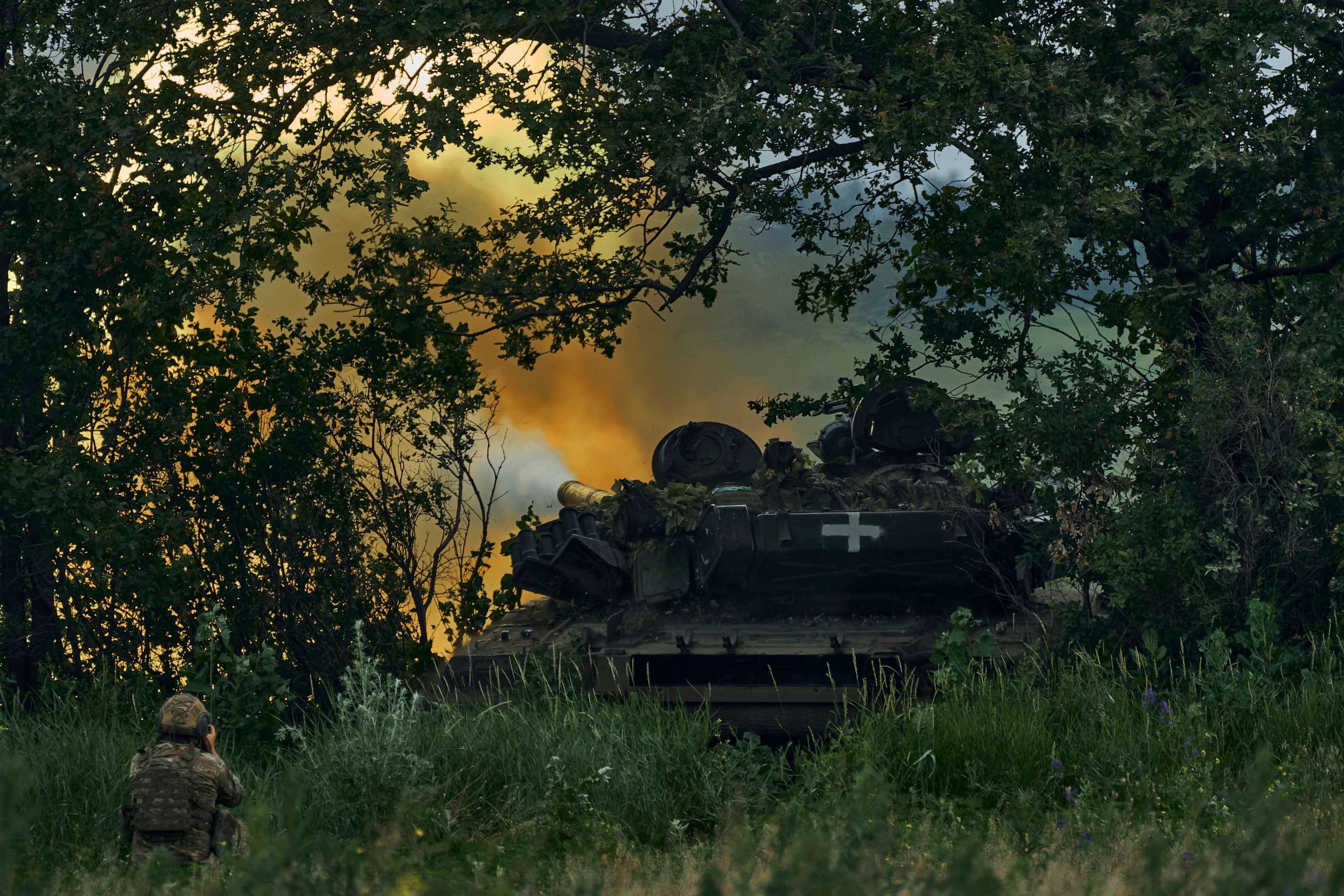 PHOTO: A Ukrainian tank fires toward Russian positions at the frontline near Bakhmut, Donetsk region, Ukraine, Saturday, June 17, 2023. (AP Photo/Libkos)