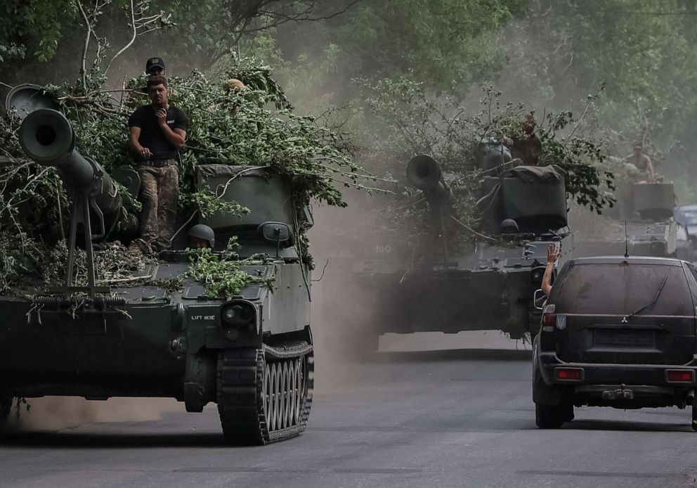 PHOTO: Ukrainian servicemen ride American M109 howitzers M109 amid Russia's attack on Ukraine, in Donetsk region, Ukraine, on June 13, 2022.
