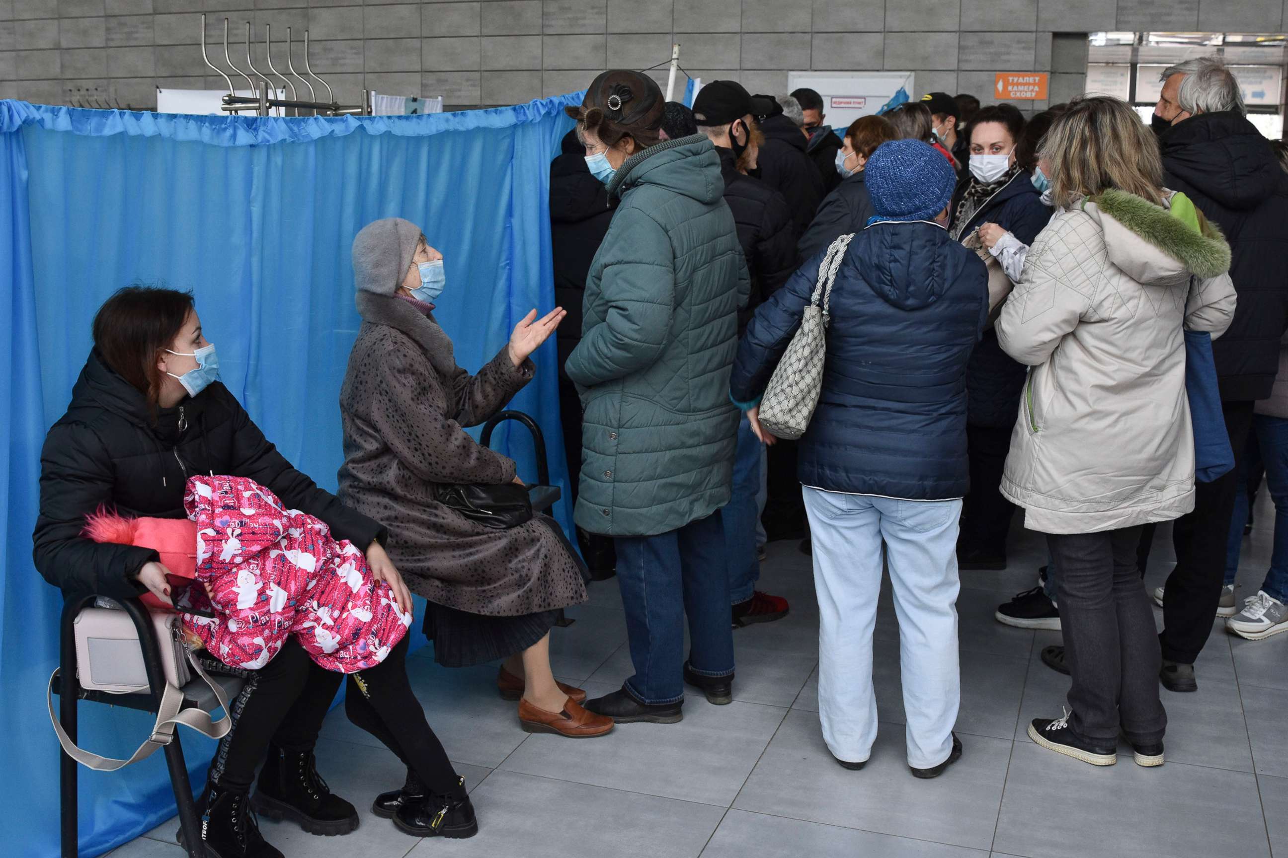 PHOTO: People wait for their turn at a vaccination center in Kramatorsk, Ukraine, Oct. 22, 2021.