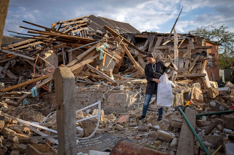 PHOTO: Anna Shevchenko, 35, rescues some of her belongings from her house in Irpin, near Kyiv, on May 3, 2022. There are no longer any walls, but among the rubble of what used to be her home, Anna Shevchenko saw a glimmer of hope.