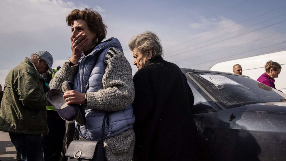 PHOTO: Natalia of Mariupol reacts after arriving at an evacuation point for people fleeing Mariupol, Melitopol and the surrounding towns under Russian control on May 2, 2022 in Zaporizhzhia, Ukraine.