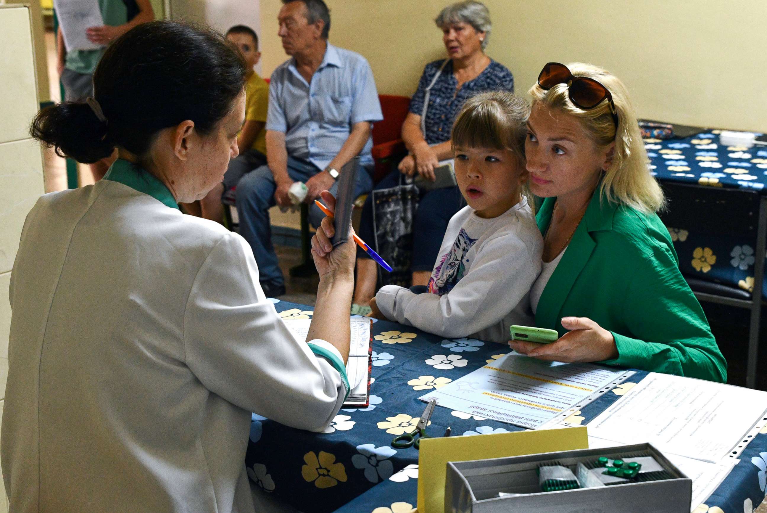 PHOTO: People receive iodine-containing tablets at a distribution point in Zaporizhzhia, Ukraine, Aug. 26, 2022. 