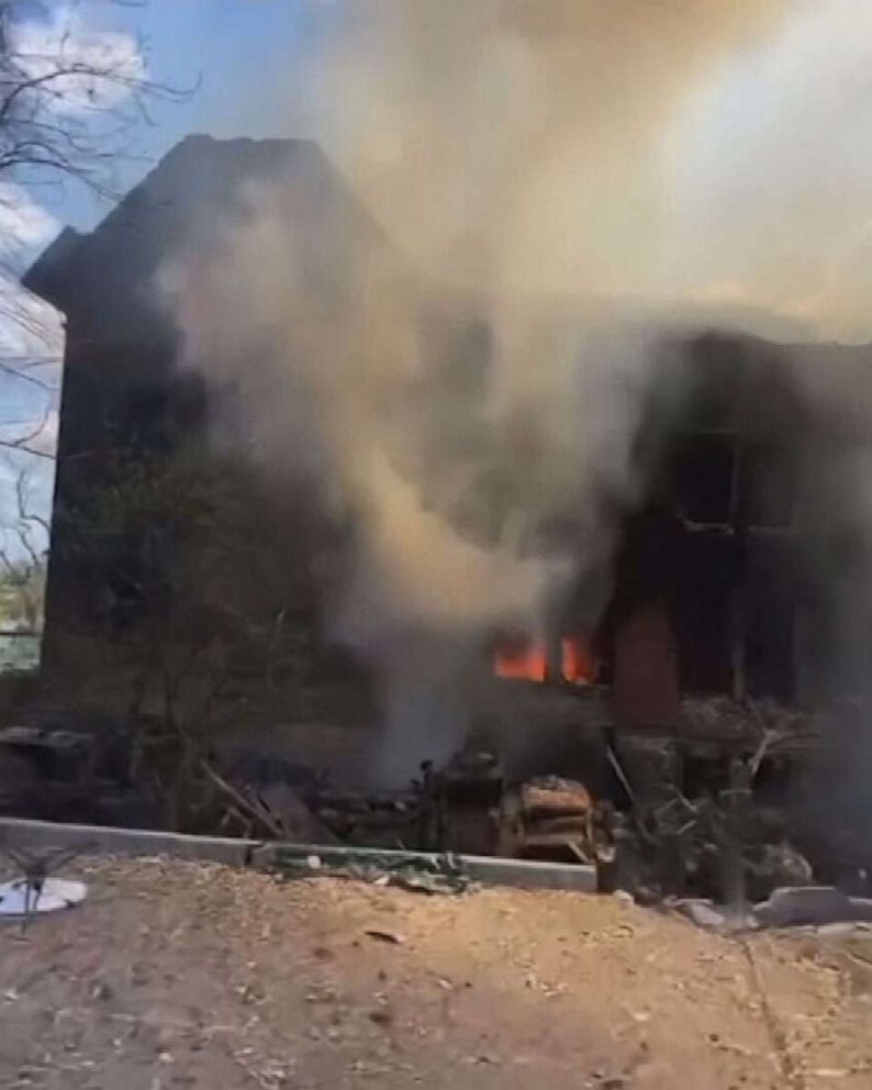 PHOTO: Lysychansk Gymnasium burns in Ukraine on May 1, 2022 in  a video grab from APTV.