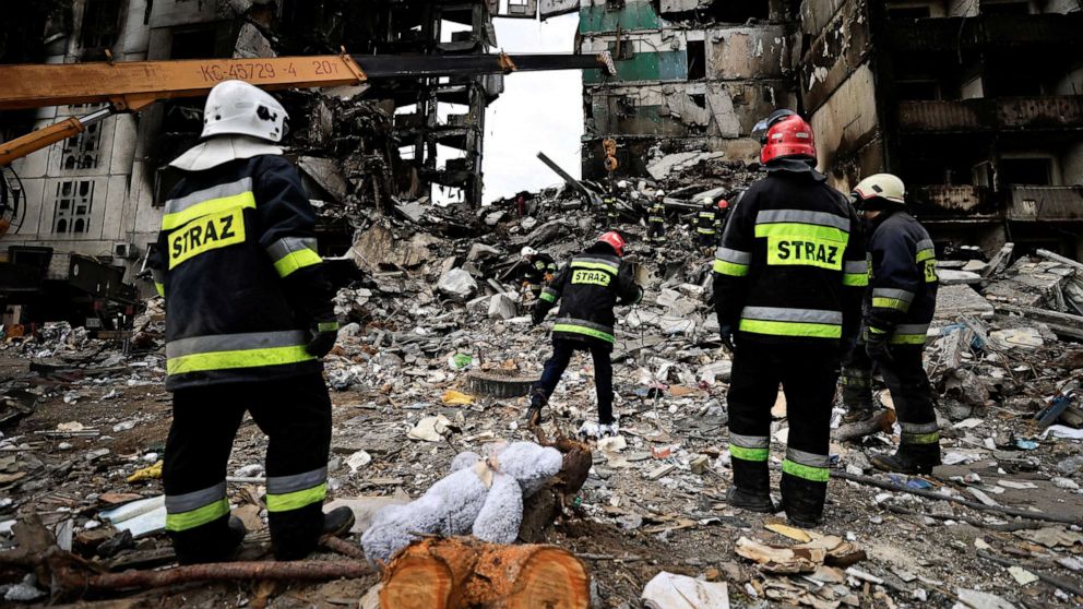 PHOTO: Rescuers search for bodies under the rubble of a building in Borodyanka, Ukraine, April 11, 2022.