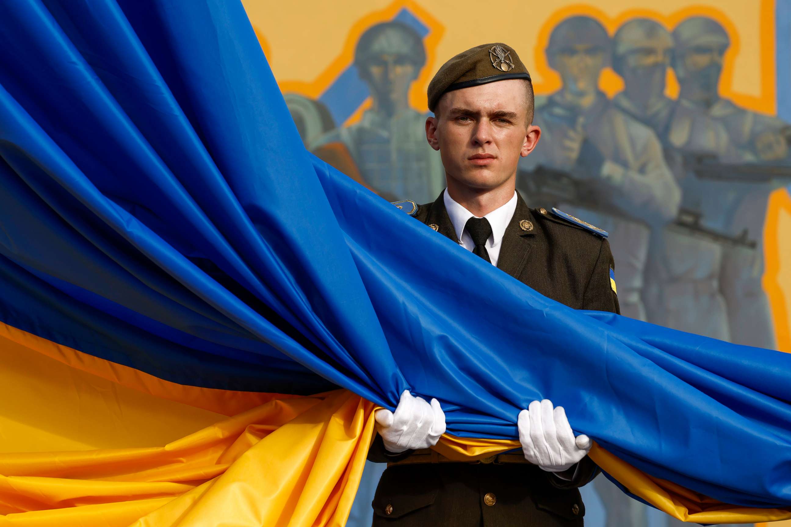 PHOTO: A member of the military attends a flag-raising ceremony at Hetman Petro Sahaidachny National Ground Forces Academy on Aug. 23, 2022, in Lviv, Ukraine.
