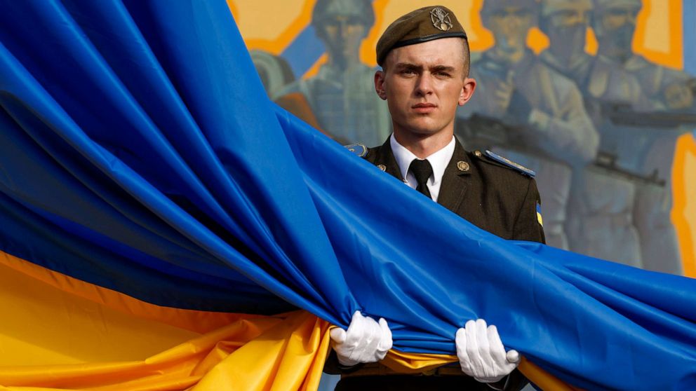 PHOTO: A member of the military attends a flag-raising ceremony at Hetman Petro Sahaidachny National Ground Forces Academy on Aug. 23, 2022, in Lviv, Ukraine.