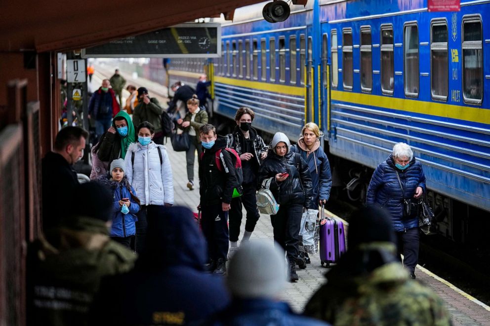 PHOTO: People fleeing the conflict in Ukraine arrive at Przemysl train station in Przemysl, Poland, on Friday, Feb. 25, 2022.