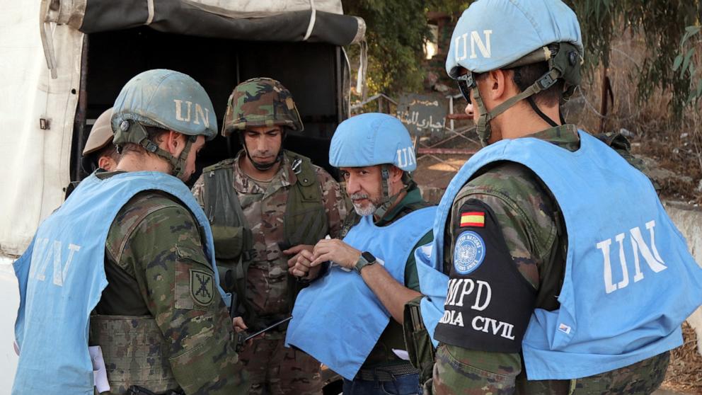 PHOTO: Spanish peacekeepers of the United Nations Interim Force in Lebanon (UNIFIL) coordinate their patrol with the Lebanese army, in Marjayoun in south Lebanon on Oct. 8, 2024. 