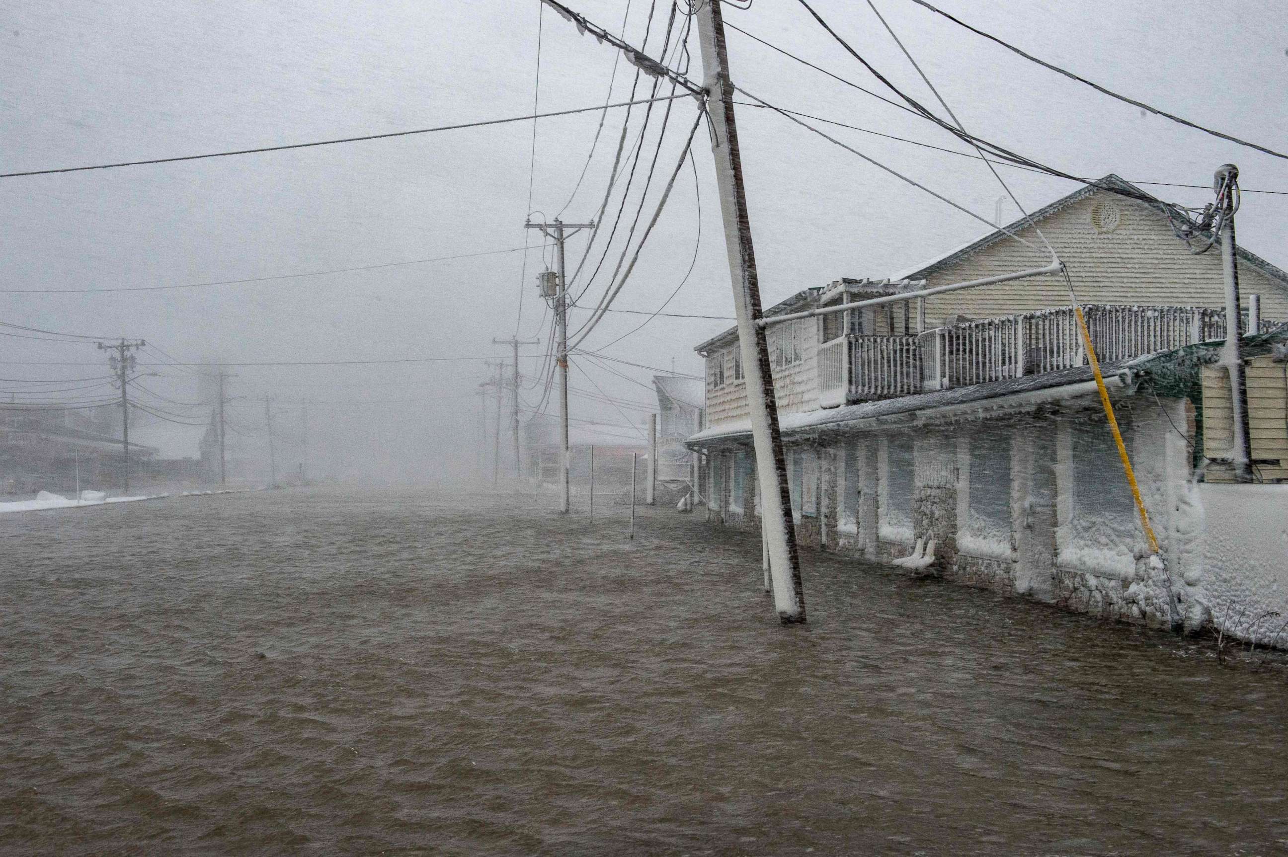 PHOTO: Streets and buildings are flooded from water coming over the seawall in Brant Rock during a nor'easter in Marshfield, Massachusetts, on Jan. 29, 2022.