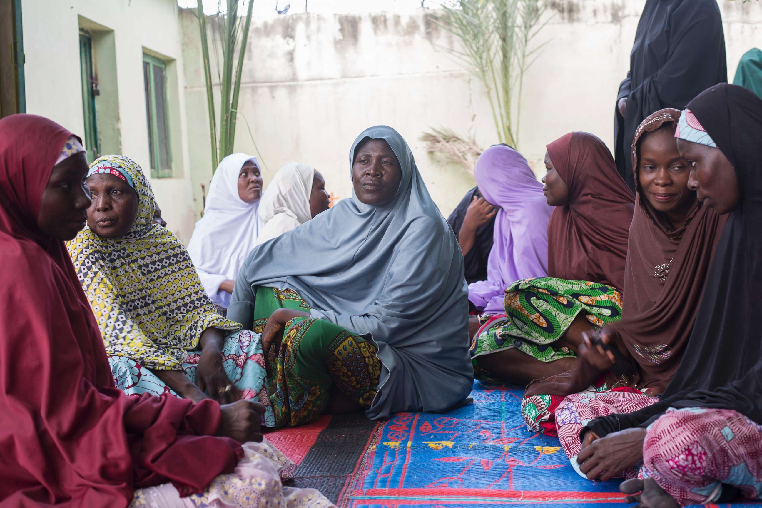 PHOTO: Some members of the Future Prowess Widows Association sit in the courtyard of the Future Prowess Islamic Foundation School in Maiduguri, Borno State, Nigeria, May 17, 2017.