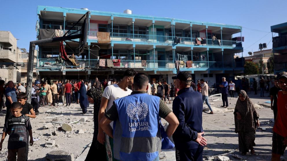 PHOTO: A member of the United Nations Relief and Works Agency for Palestine Refugees checks the courtyard of a school after an Israeli air strike hit the site, in Nuseirat in the central Gaza Strip on Sept. 11, 2024.