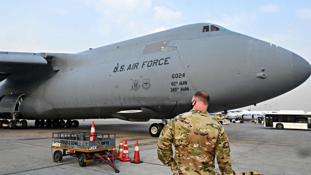 PHOTO: An U.S Air Force aircraft carrying COVID-19 relief supplies is seen on the tarmac after landing at the Indira Gandhi International Airport cargo terminal in New Delhi on April 30, 2021.